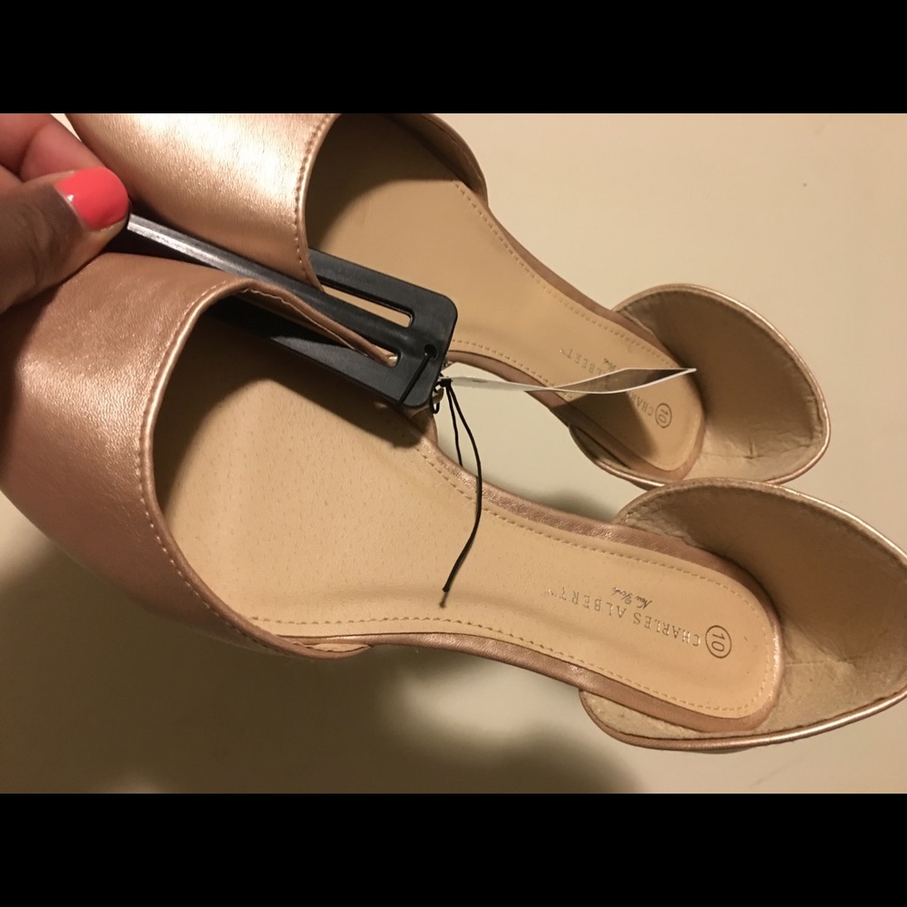 Rose gold flats.